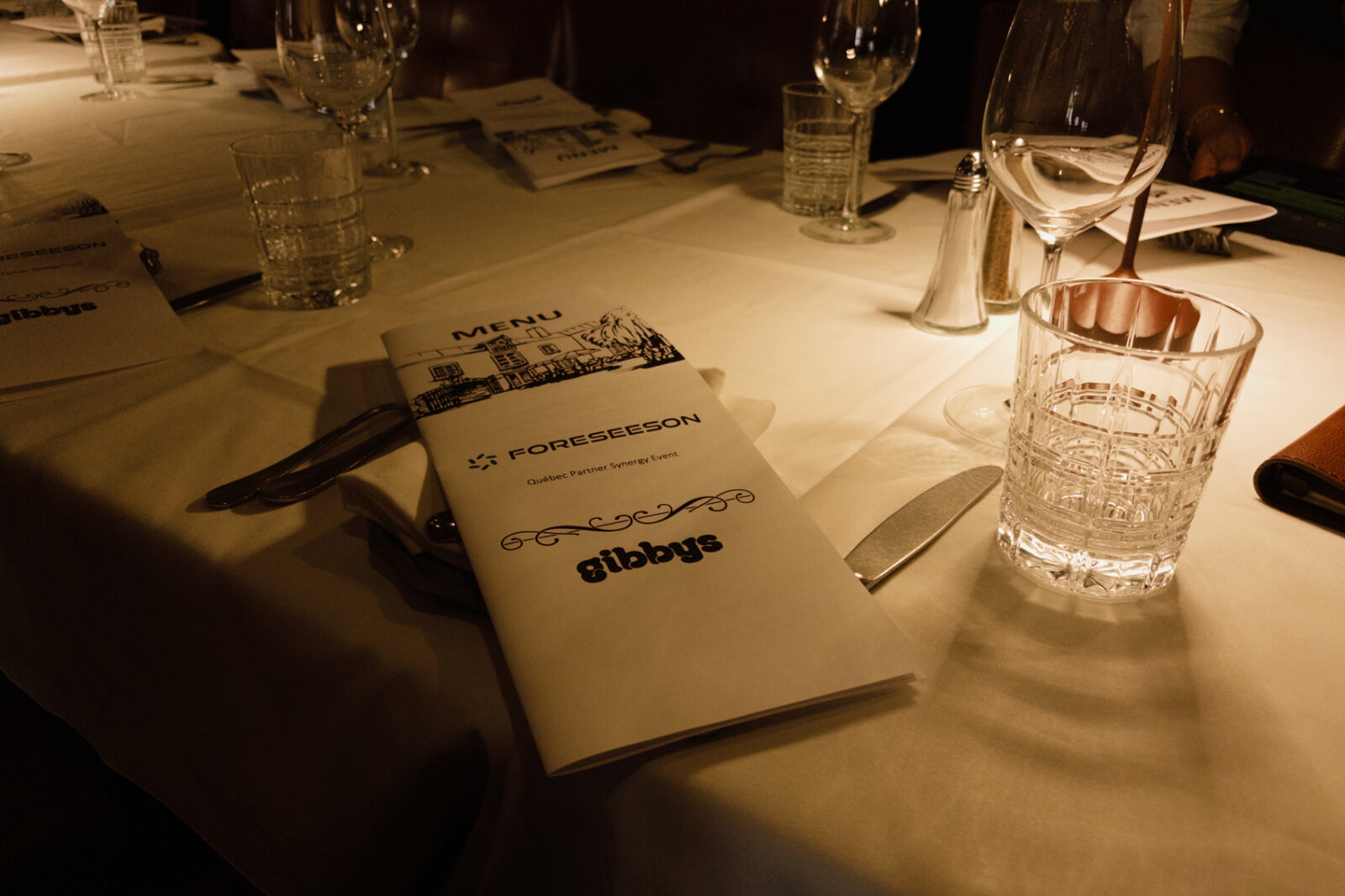 Custom Foreseeson menu on a set dinner table